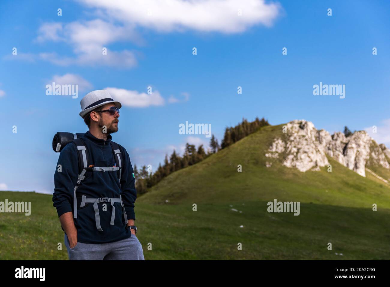 Skywalk Rarau A cheerful traveler posing in the background of Rarau Mountains ...