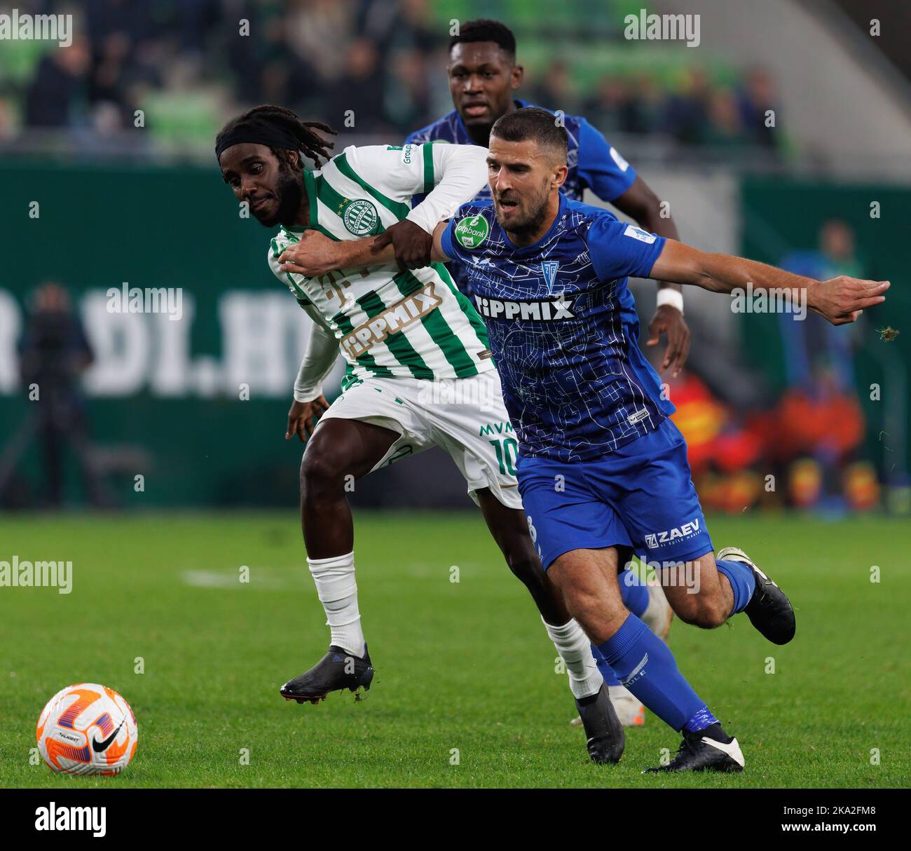 BUDAPEST, HUNGARY - AUGUST 29: (l-r) Tokmac Chol Nguen of Ferencvarosi TC  celebrates his goal in front of Gergo Lovrencsics of Ferencvarosi TC during  the UEFA Europa League Play-off Second Leg match