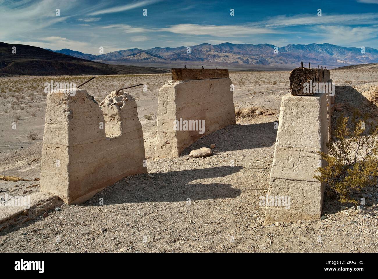 Ashford Mill ruins with Panamint Range in distance, Mojave Desert, Death Valley National Park, California, USA Stock Photo