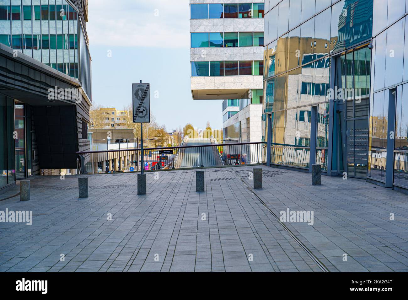 An urban scenery with an empty street and modern buildings Stock Photo ...