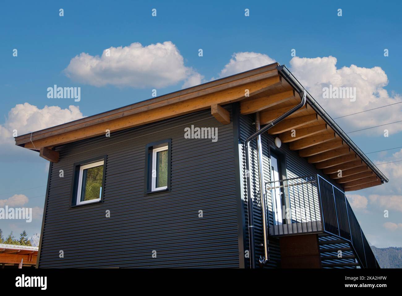 Modern house with metal facade or sheet metal facade Stock Photo - Alamy