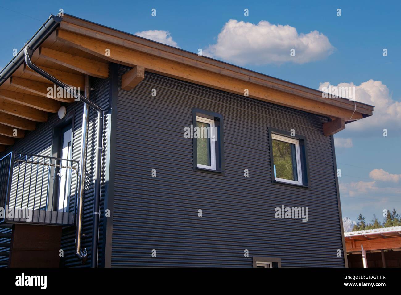 Modern house with metal facade or sheet metal facade Stock Photo - Alamy