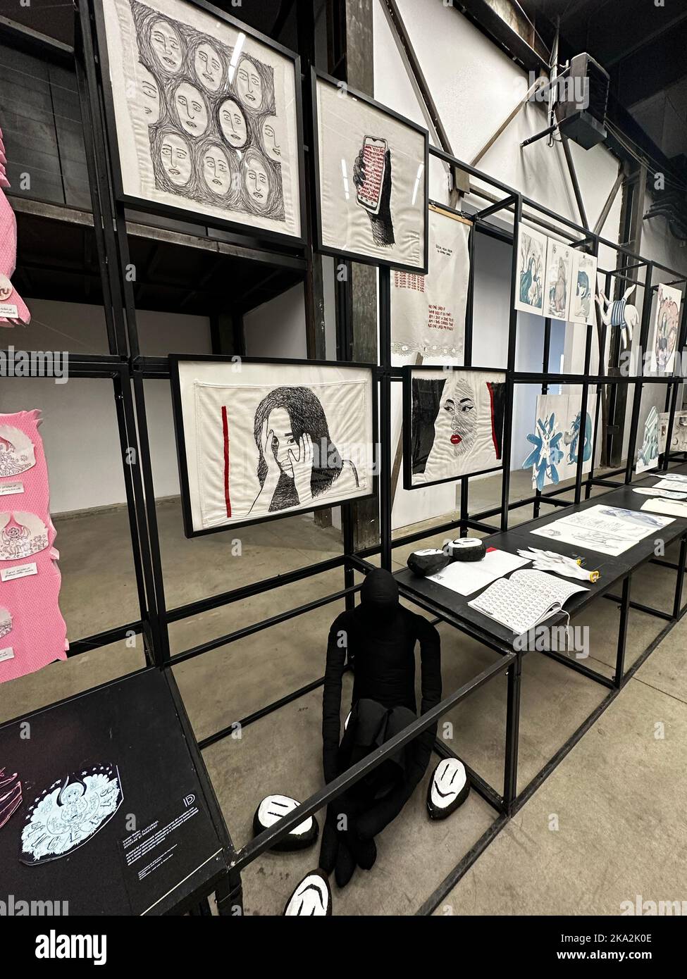A vertical shot of artworks on display at Diploma Exhibition in ...