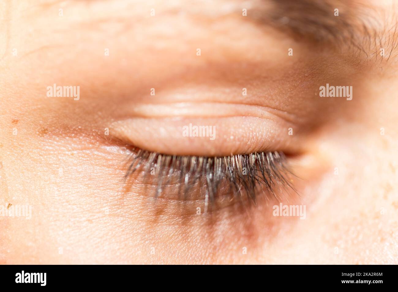 close up view of a boy closed eye Stock Photo