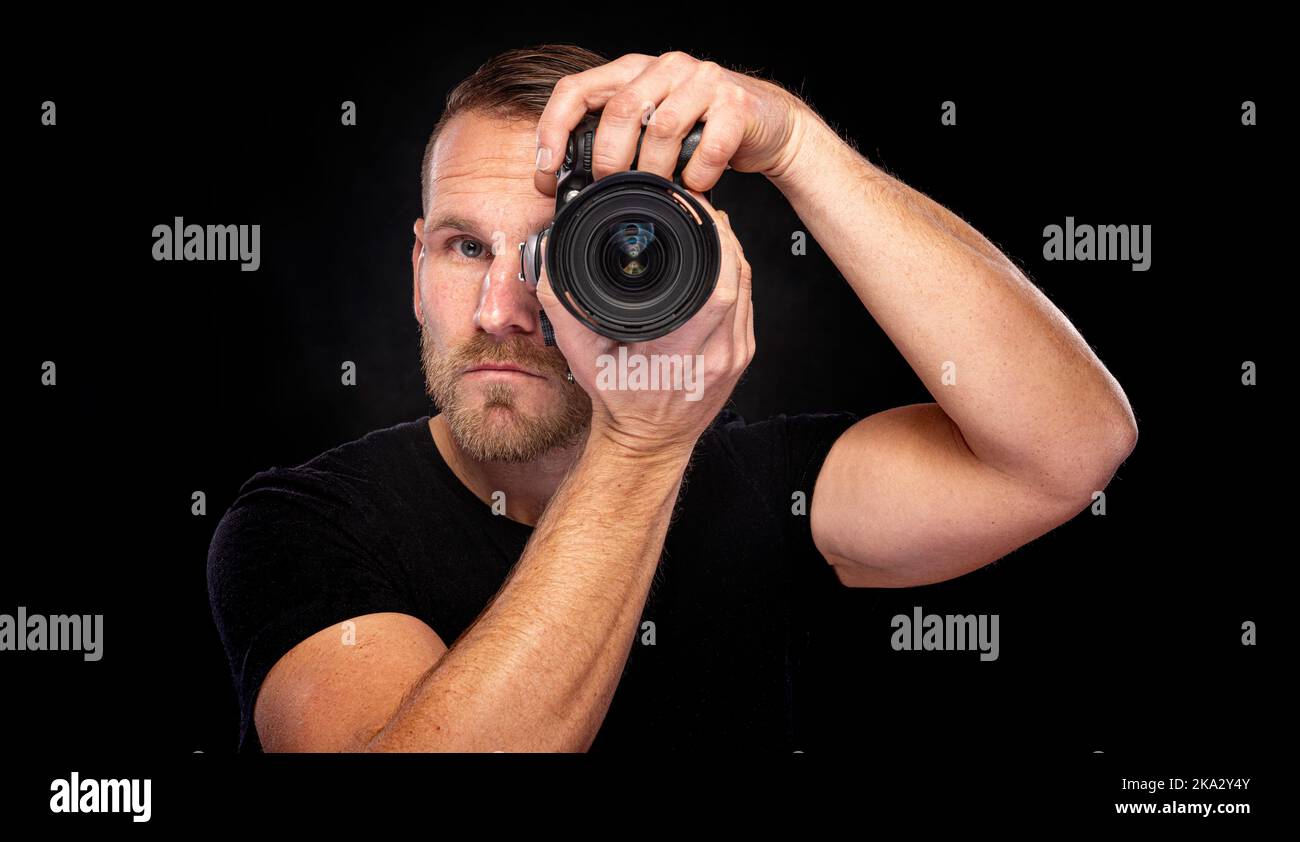 Old man with a beard and dark shirt hi-res stock photography and images ...