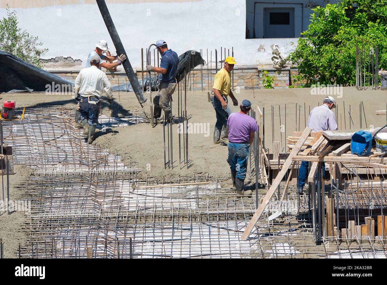 construction workers while working in a building under construction ...