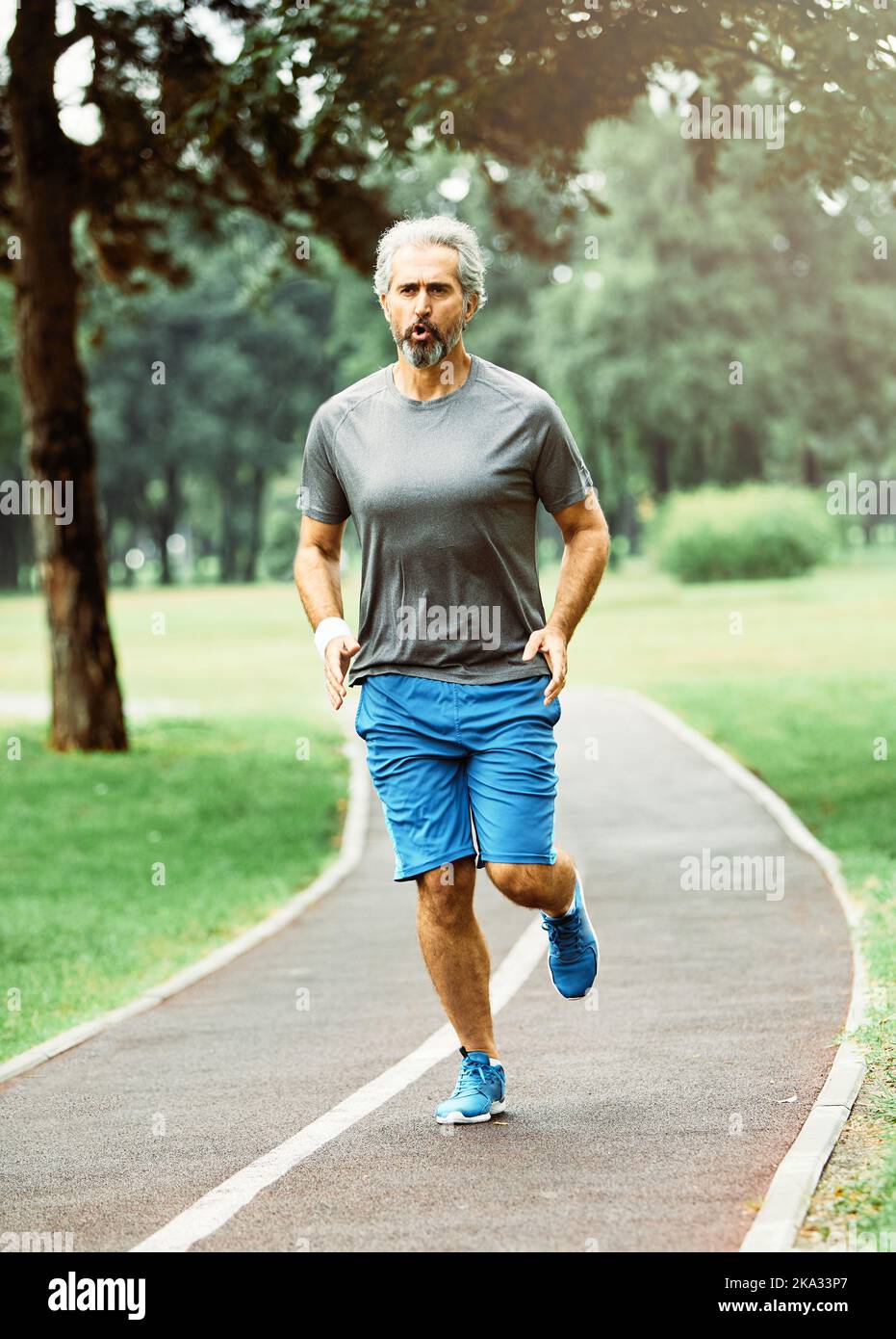 senior fitness man active sport exercise running jogging healthy runner
