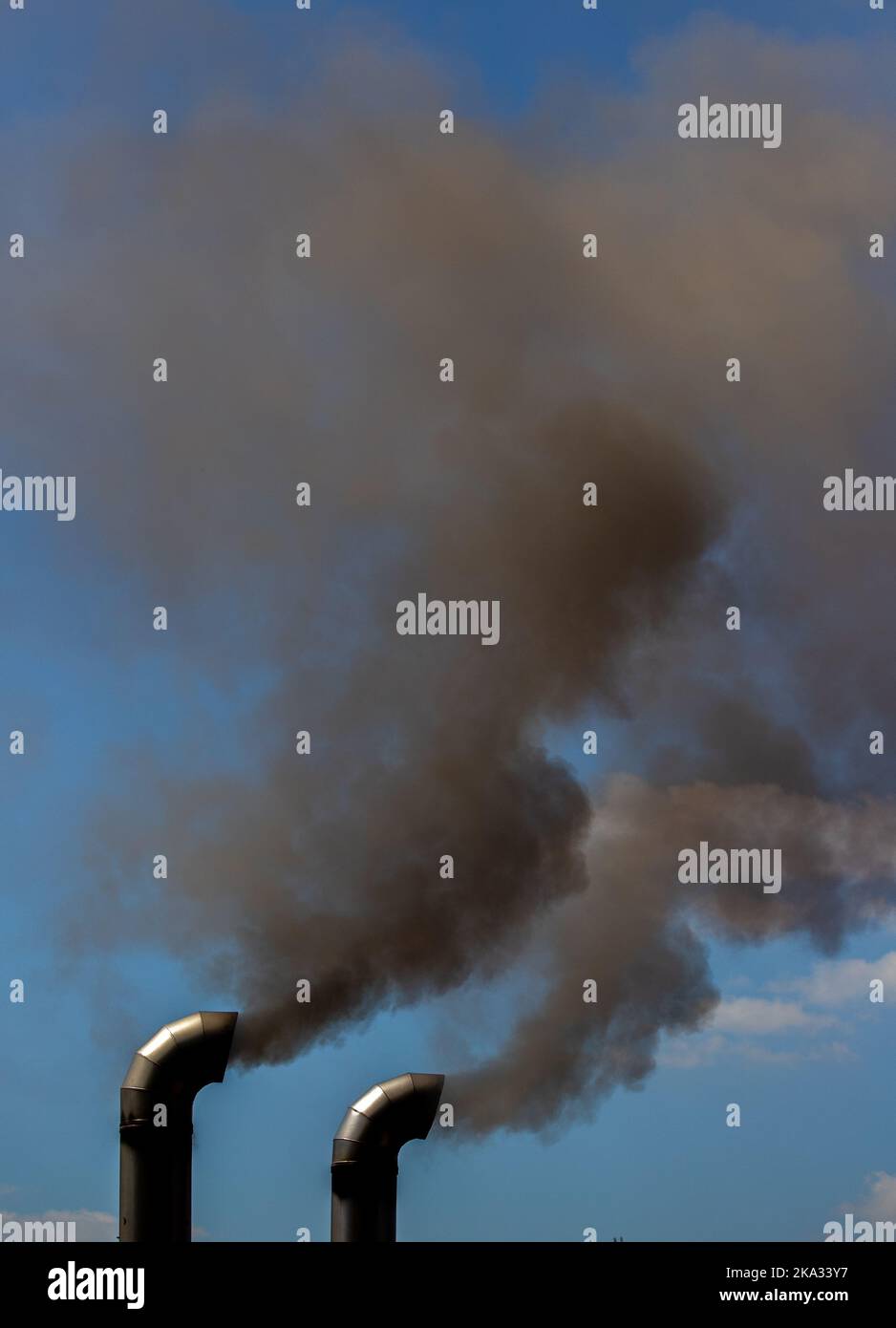 black smoke coming out of the chimney, toxic, pollution Stock Photo