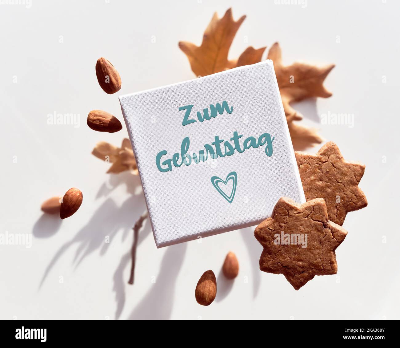 Canvas with text Zum Geburtstag that means Happy Birthday in German language. Flying, levitating