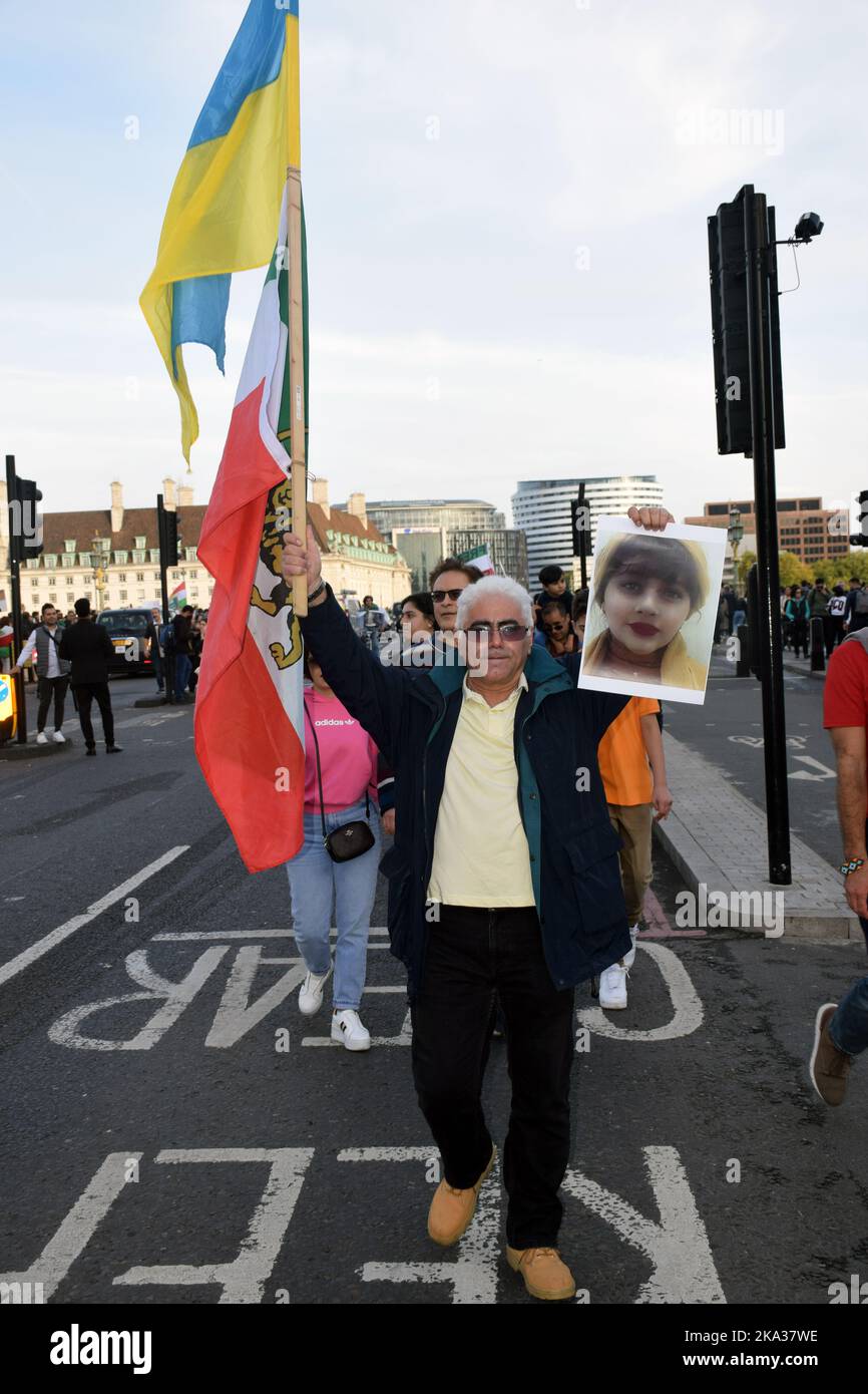 Protest opposite Houses of Parliament to show solidarity with the 'the women's revolution' in Iran sparked by Mahsa Amini's death. London UK 29 Octobe Stock Photo