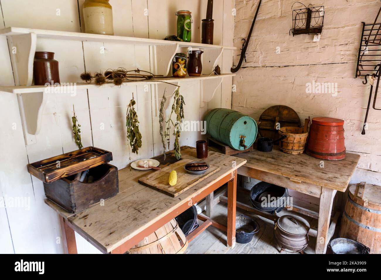 Traditional kitchen in an American farm house from the 19th Century 1800s. Stock Photo