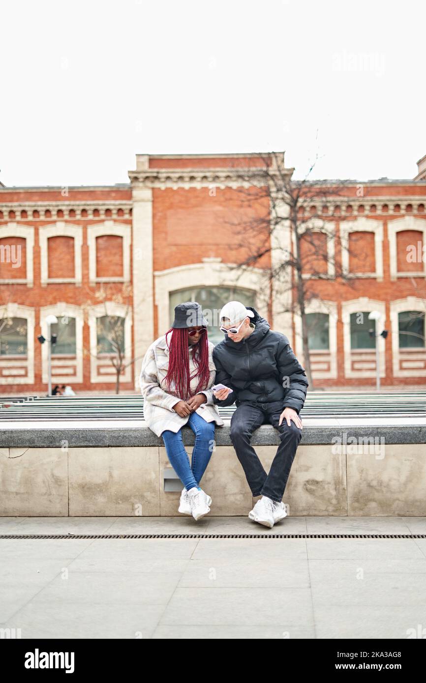 smiling young Multiethnic couple on the street. Stock Photo