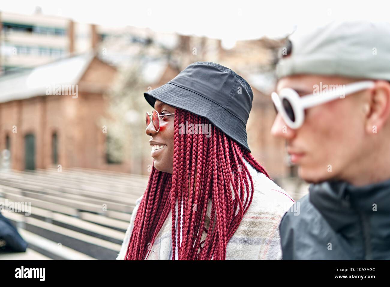 Smiling young Multiethnic couple on the street. Stock Photo