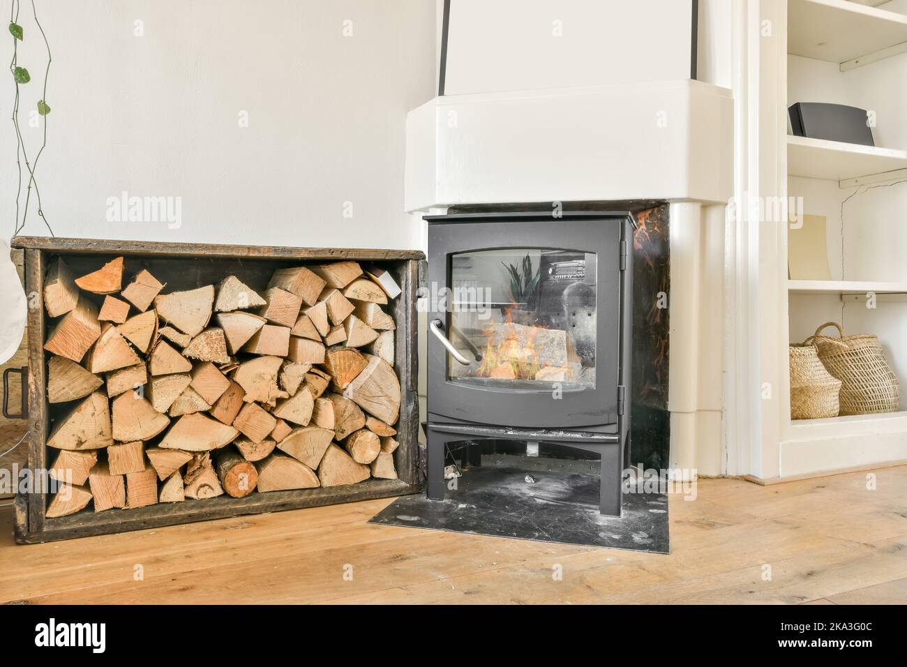 Interior of cozy classic living room with white wall and parquet floor
