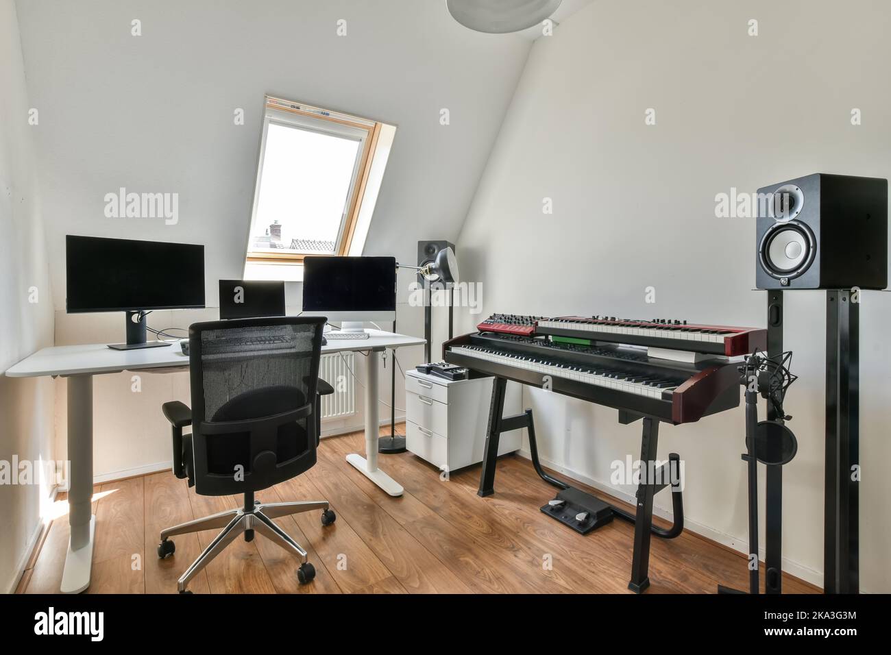 Interior of modern workspace in flat with desk with computer desktops and office chair near