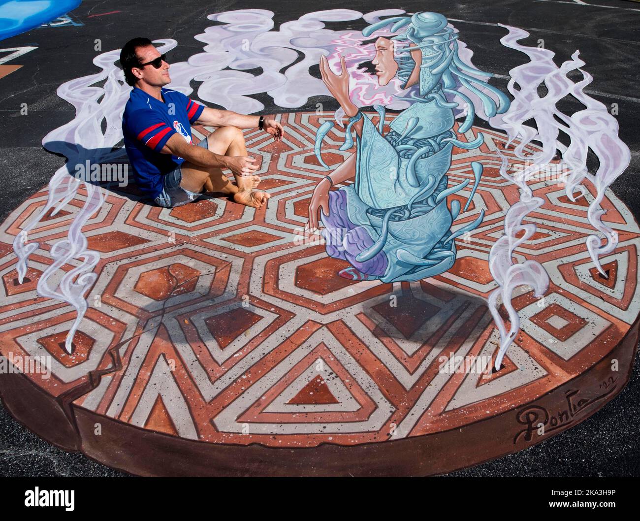 Sarasota, Florida, USA. 30th Oct, 2022. Interactive 3D chalk art illusions are displayed in