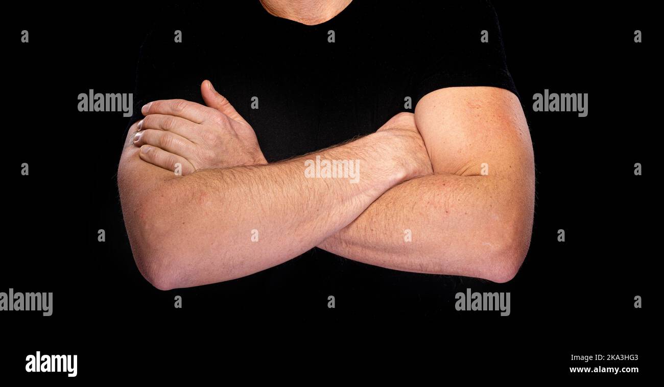 Male arms crossed on the chest Stock Photo Alamy