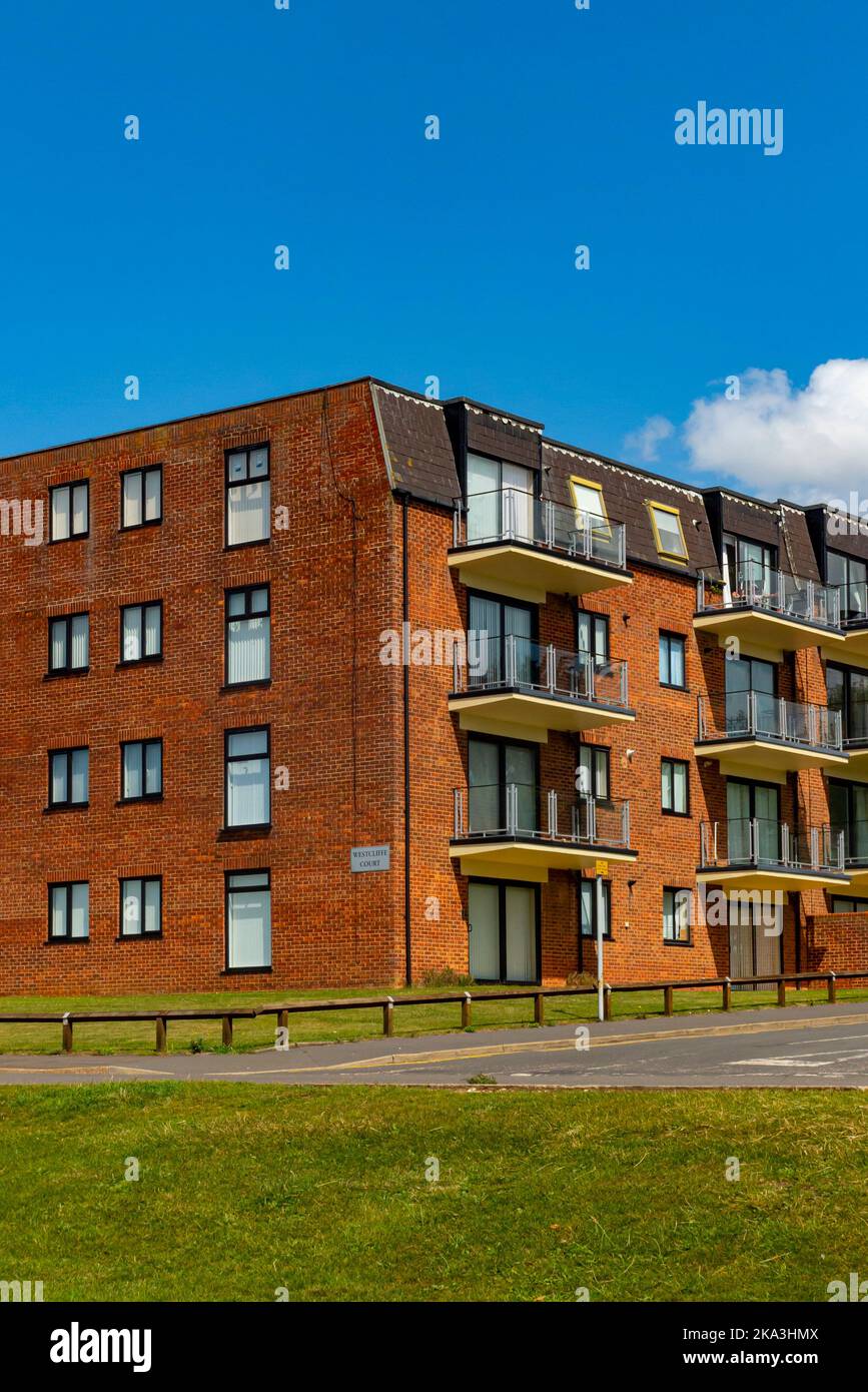 Block of modern flats on the cliff top at the seaside resort of Hunstanton on the north west Norfolk coast in eastern England UK. Stock Photo