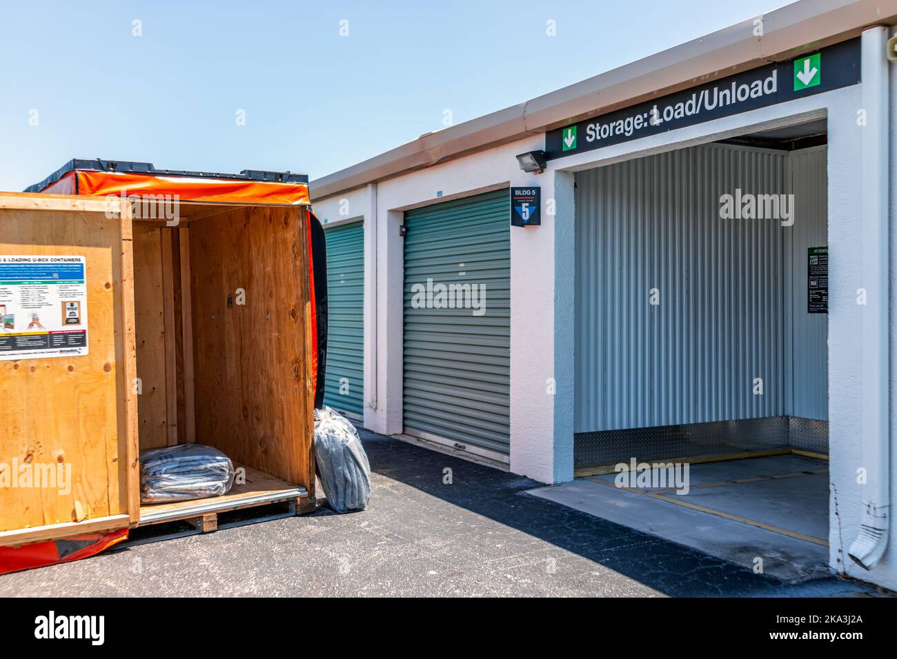 Ft Myers, USA - May 16, 2022: Opened U-box of U-haul for loading and home delivery with self-storage climate controlled unit for storing furniture whe Stock Photo
