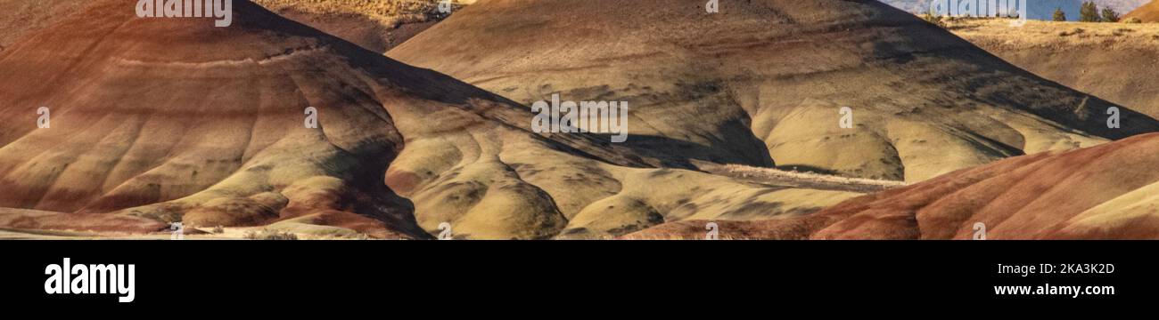 The painted Hill of John Key Fossil Beds, with the morning sun lighting up the hills. Stock Photo