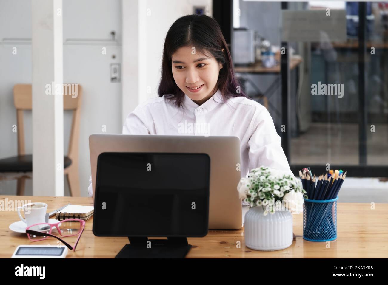 new normal, a businesswoman uses a computer to work for a company Via