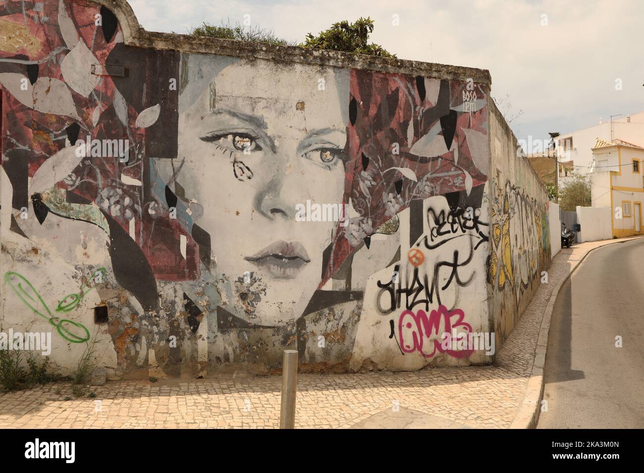 A mural of a woman on a wall, Lagos, Portugal Stock Photo