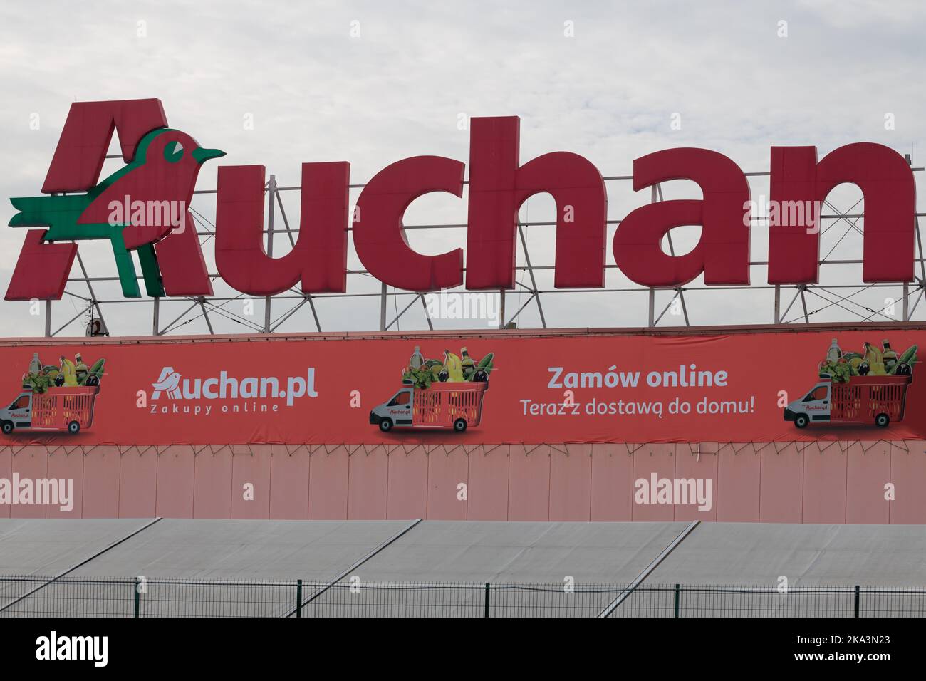 Poland, Poznan - October 30, 2022: Logo or symbol of Auchan in a retail park Auchan is a French chain of hypermarkets, supermarkets and superstores. Stock Photo