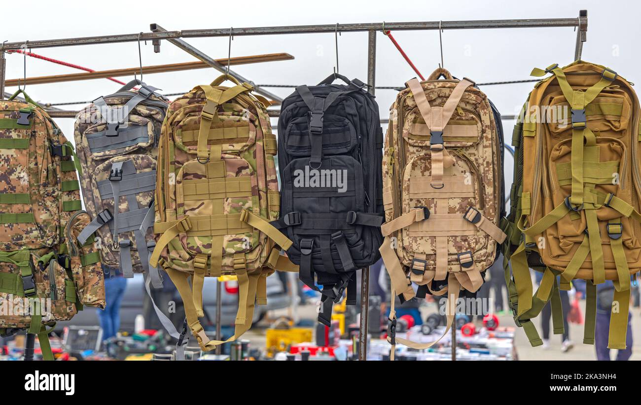Military Style Army Camo and Tactical Backpacks for Sale Stock Photo