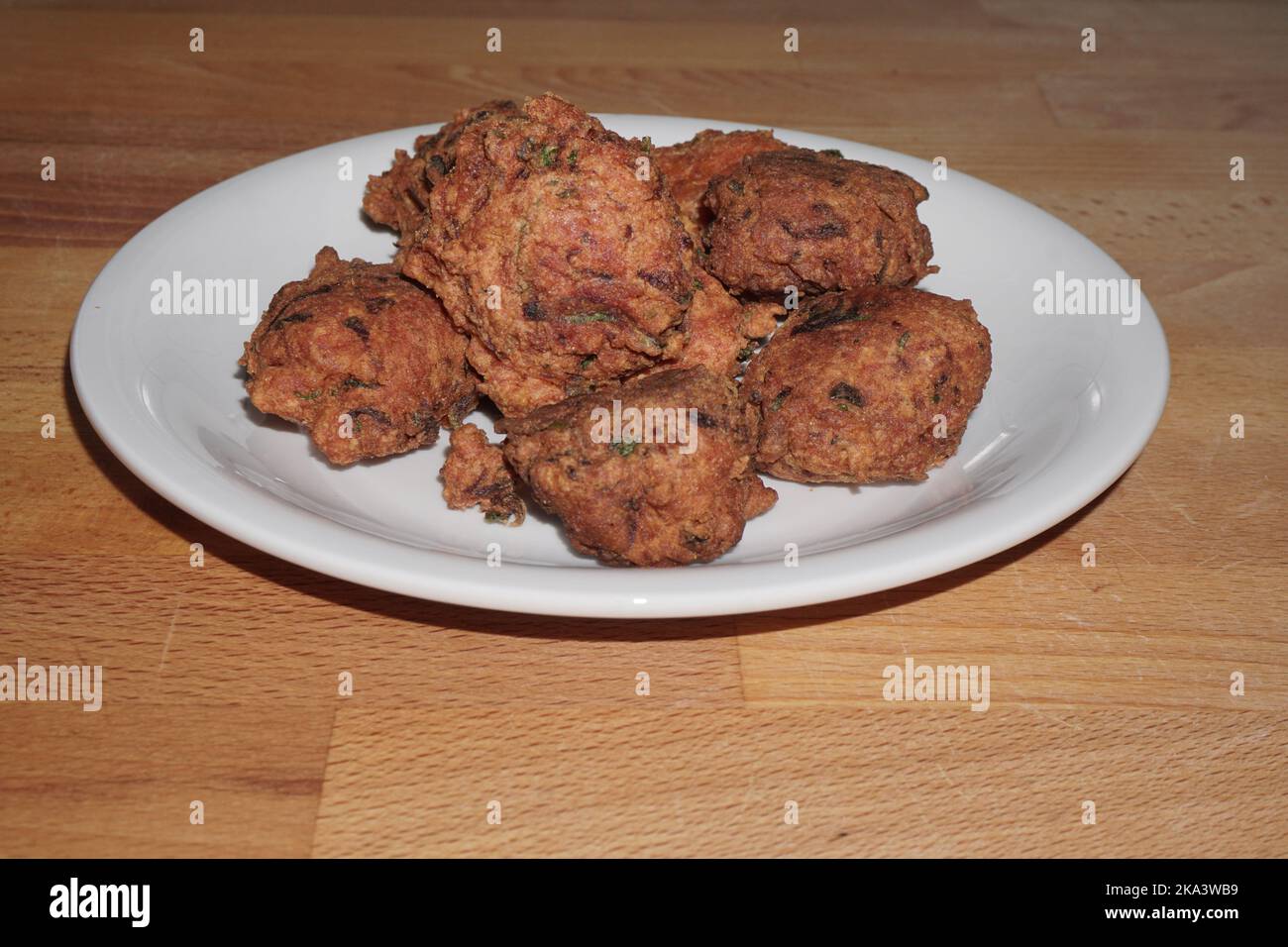 Pakoda or Pakora. typical fritters of Indian cuisine Stock Photo