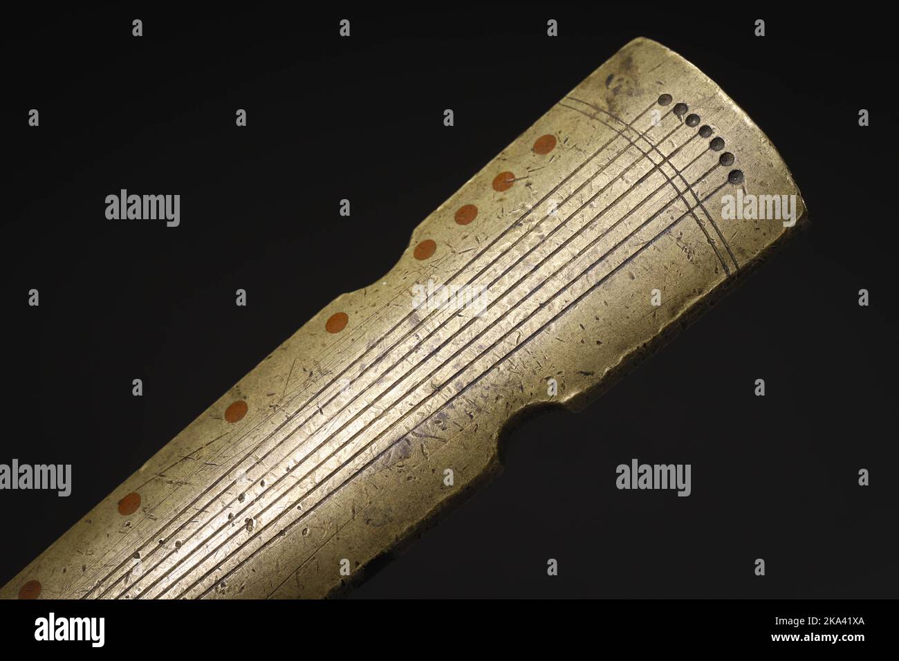A closeup of a Guqin (traditional Chinese musical instrument) isolated ...