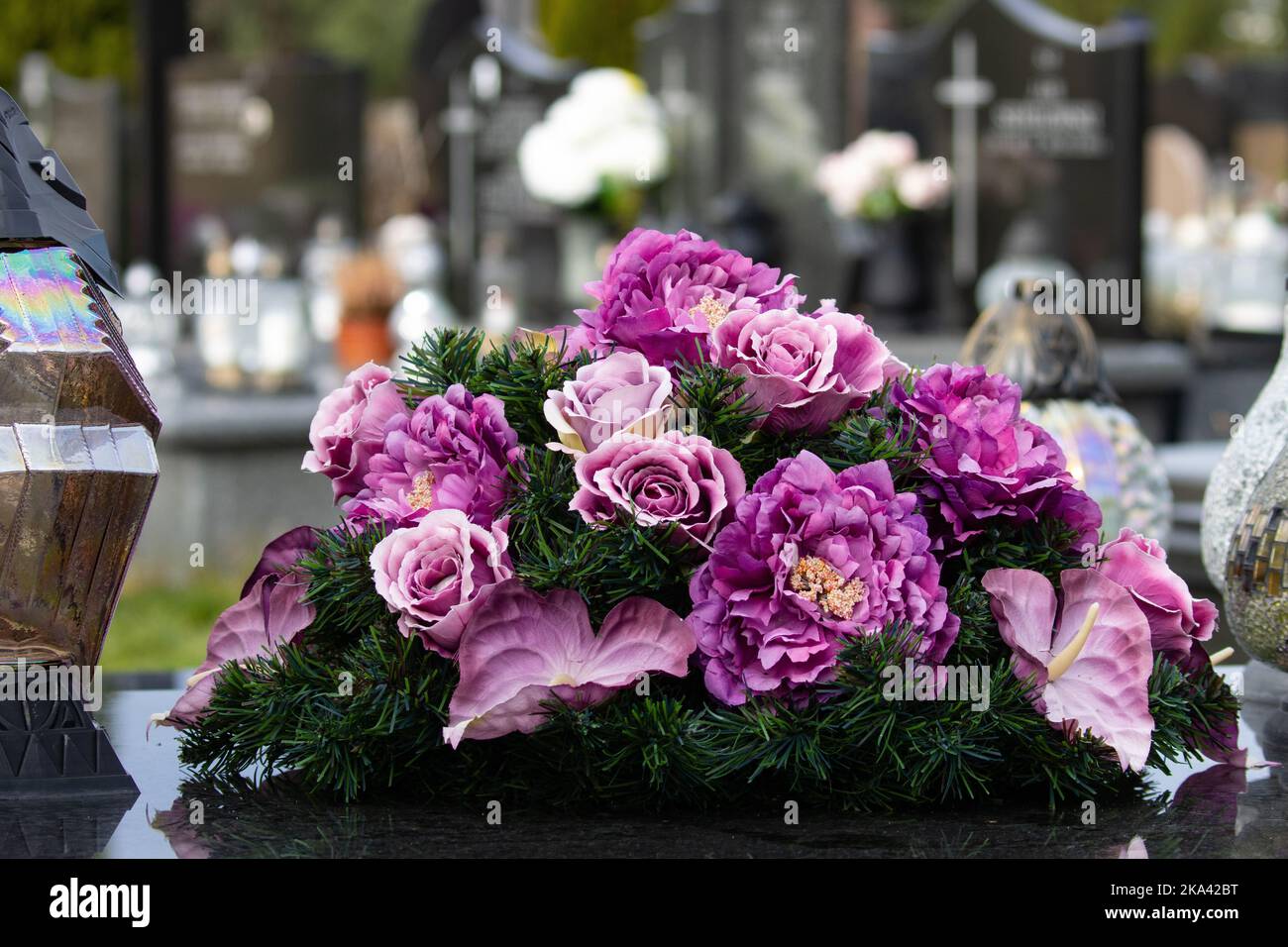 Flowers on the grave. Feast of the Dead. A bunch of flowers in the