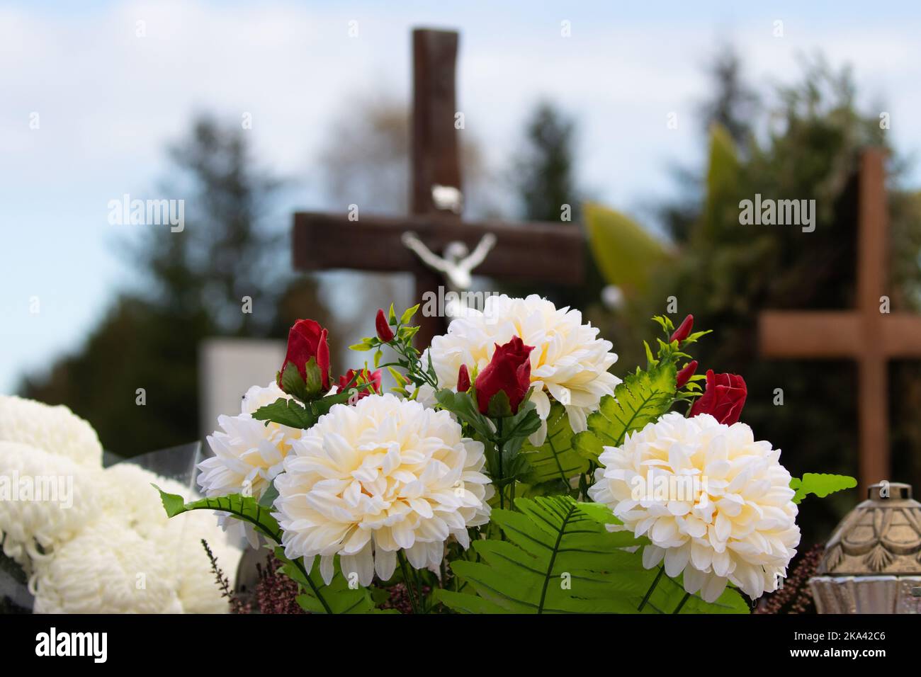 Flowers on the grave. Feast of the Dead. A bunch of flowers in the