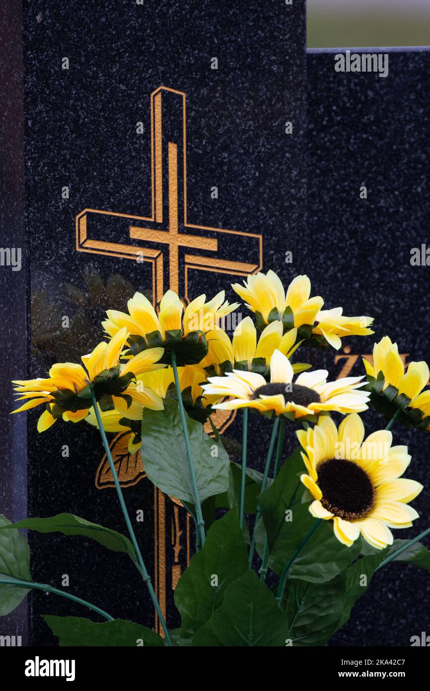 Flowers on the grave. Feast of the Dead. A bunch of flowers in the