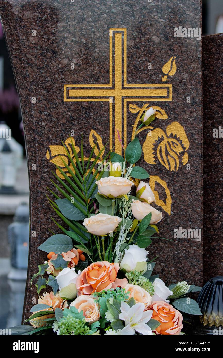 Flowers on the grave. Feast of the Dead. A bunch of flowers in the