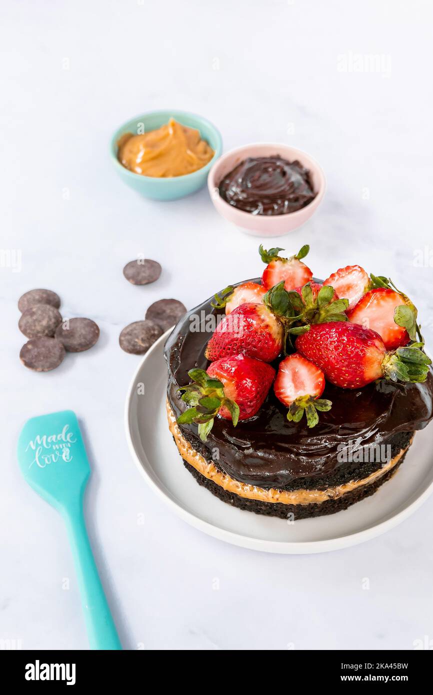 A high angle of a chocolate cake decorated with strawberries Stock ...
