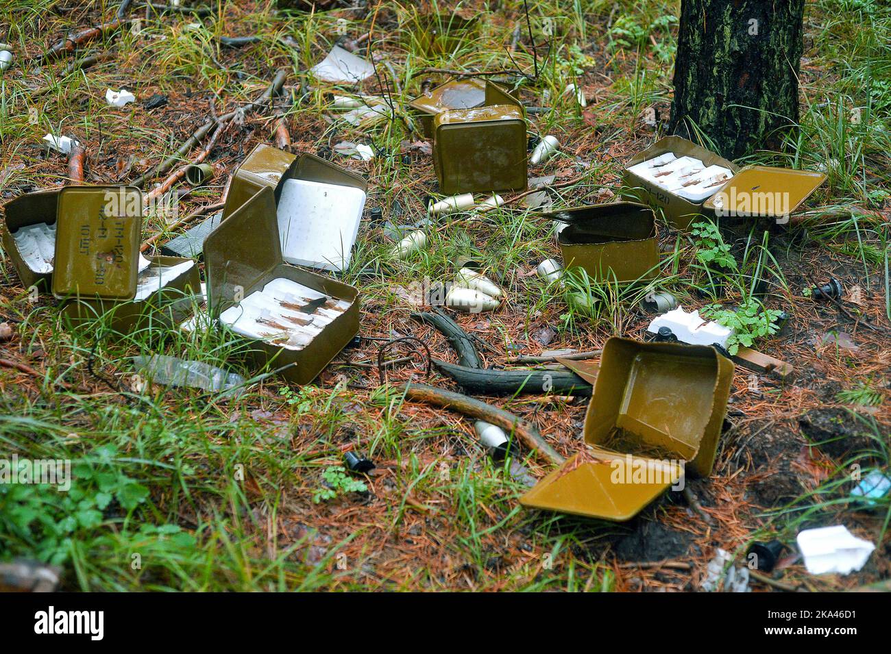 KHARKIV REGION, UKRAINE - OCTOBER 26, 2022 - The boxes with the fuses for a BM-21 Grad multiple rocket launcher is pictured in a forest near Izium aft Stock Photo