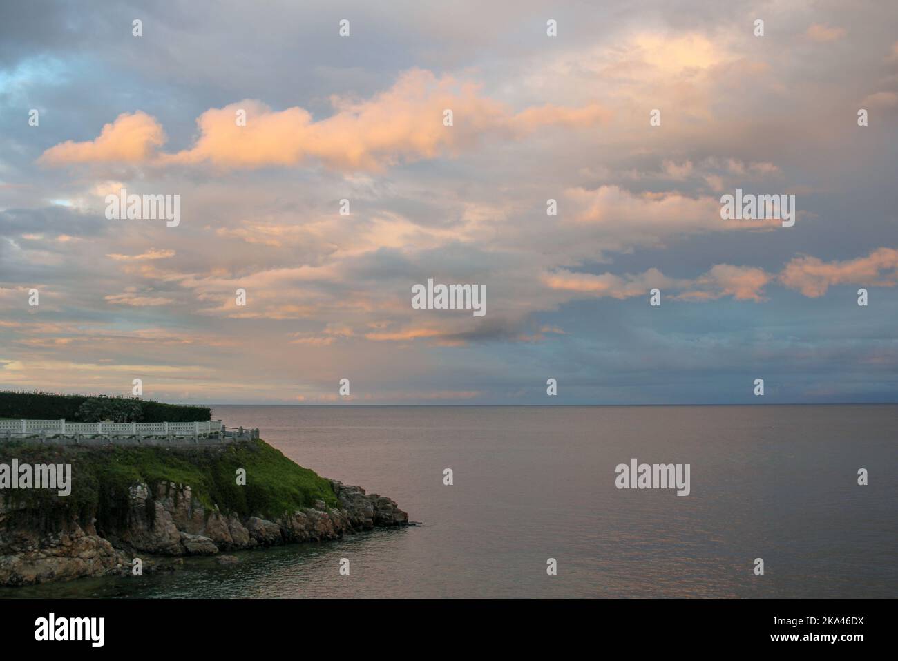 Cloudy sky reflected in the sea hi-res stock photography and images - Alamy