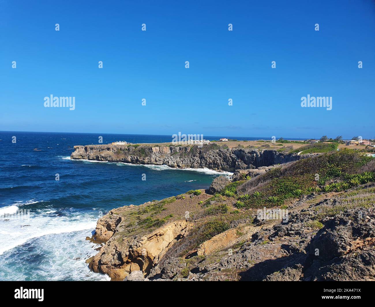 An aerial view of sea waves breaking rocky beach Stock Photo - Alamy