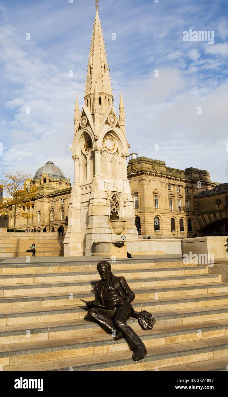 Bronze statue of Economist, Banker and Member of Parliament, Sir Thomas Attwood, sitting on steps at Chamberlain Square, Birmingham, Warwickshire, Wes Stock Photo