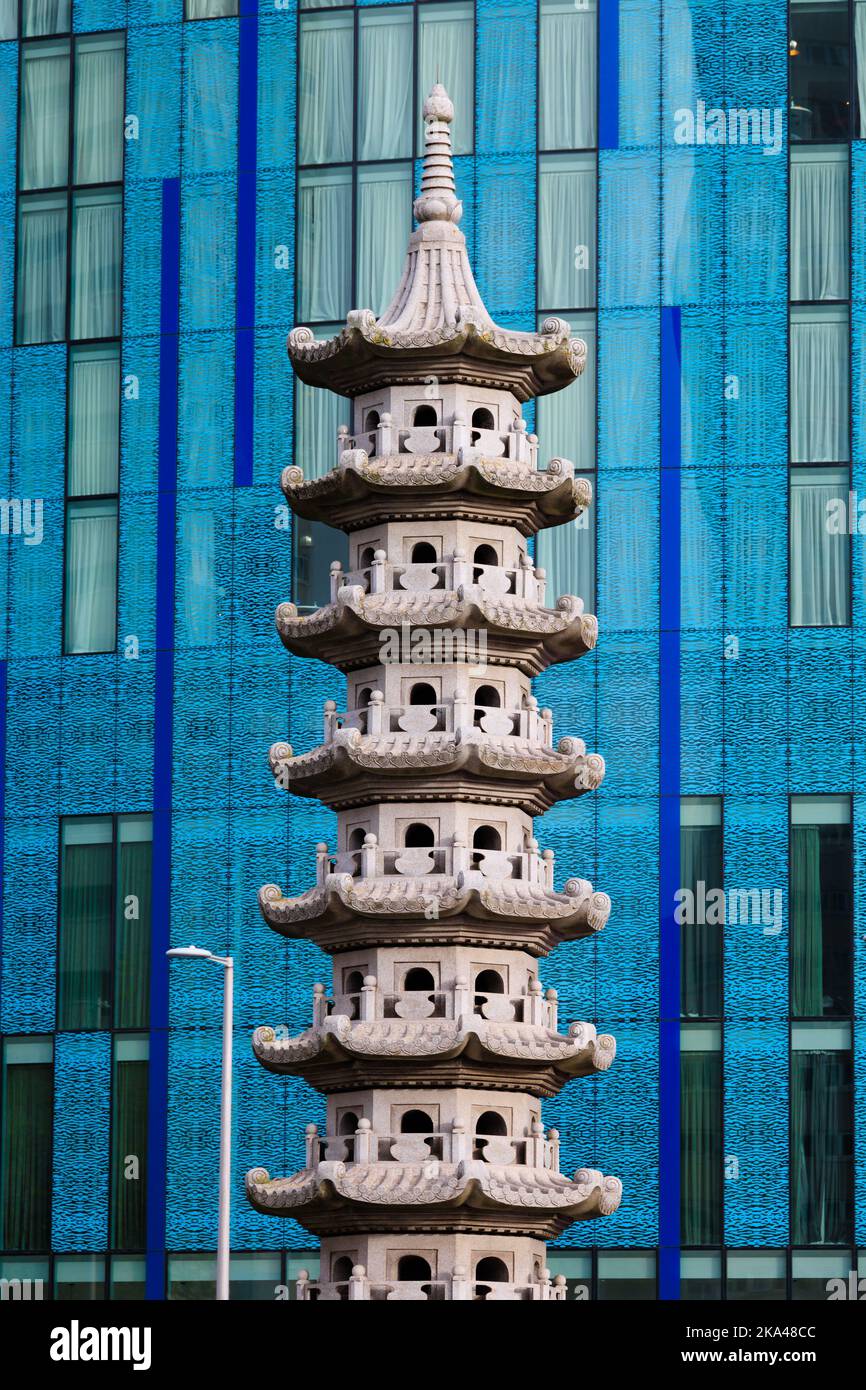 Chinese pagoda in front of the blue glass, Radisson Blu hotel, Holloway Circus, Queensway, Birmingham, Warwickshire, West Midlands, England. Stock Photo