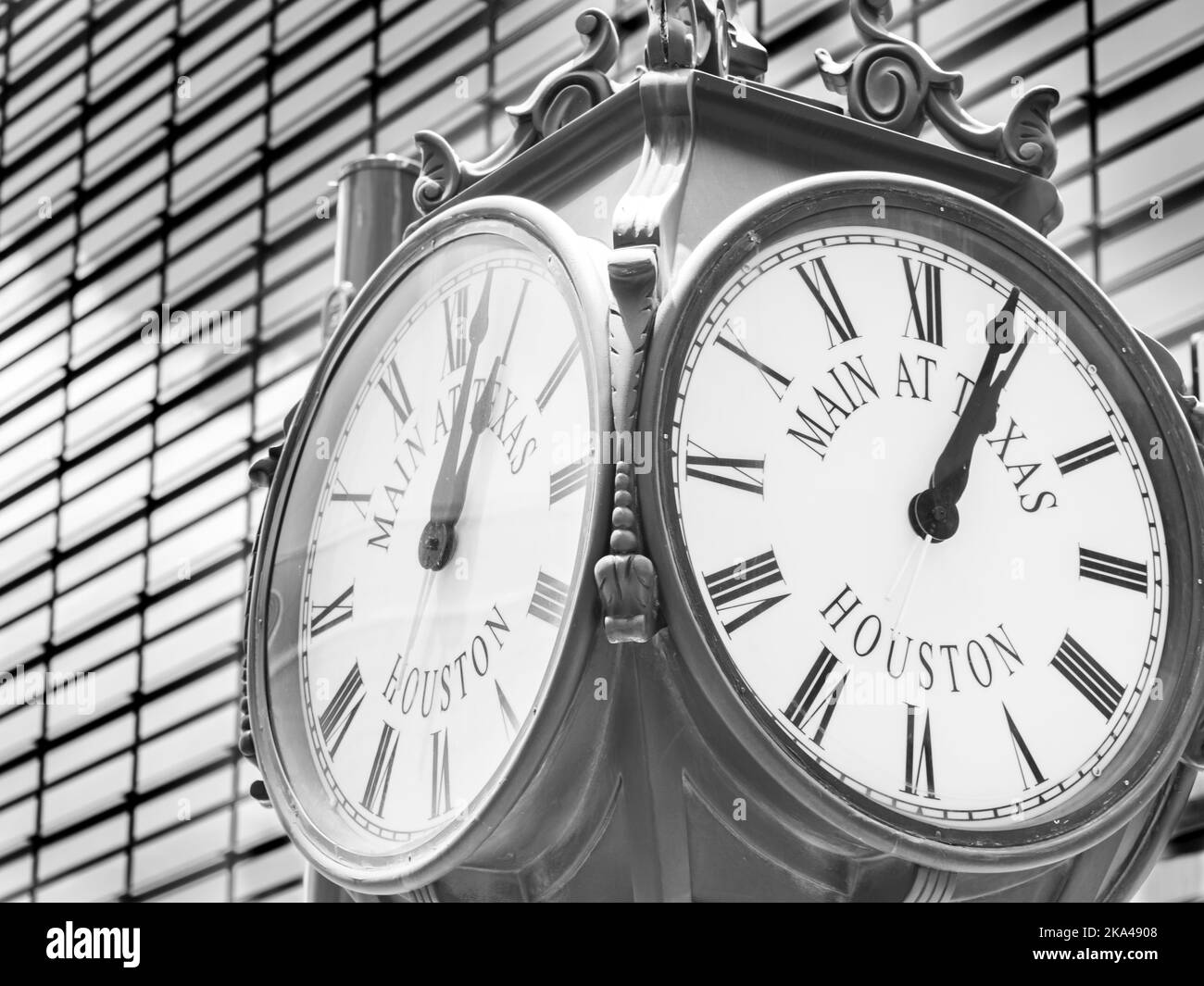 A black and white shot of a clock in Downtown Houston, Texas Stock