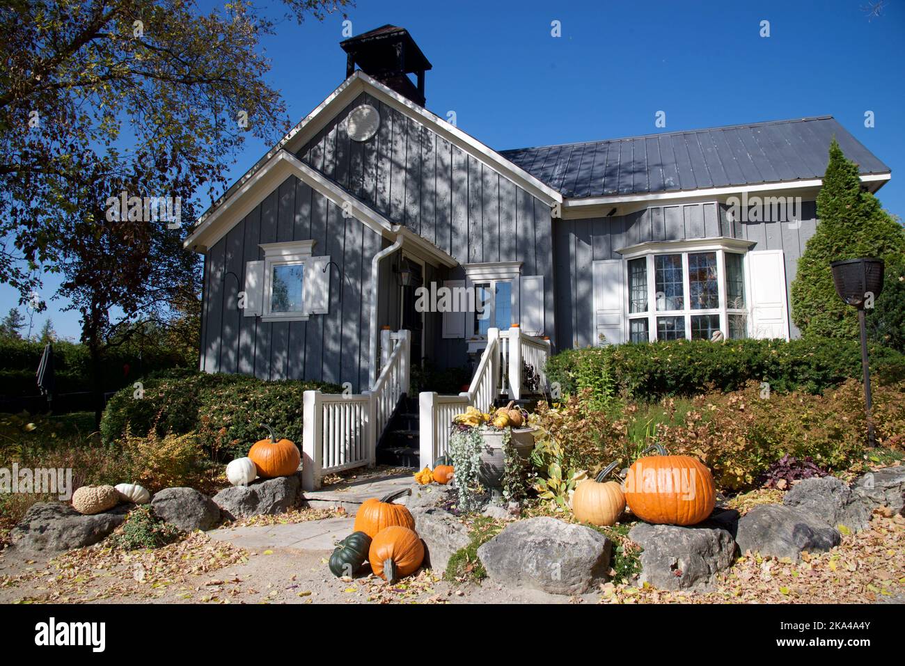 Halloween decoration with pumpkins on a Victorian-style house Stock Photo