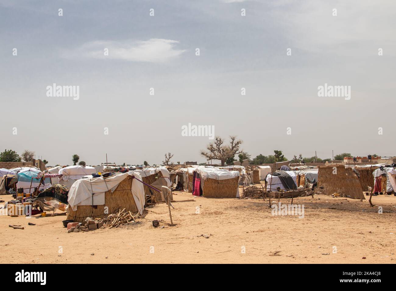 Refugee camp in Africa, full of people who took refuge due to insecurity and armed conflict. People living in very poor conditions Stock Photo