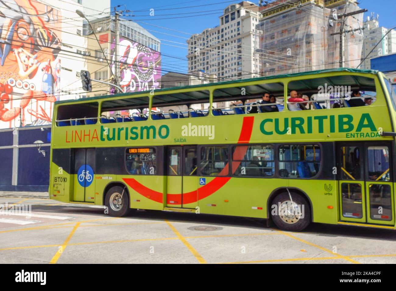 Curitiba, Brazil: touristic bus riding passengers on city streets Stock Photo