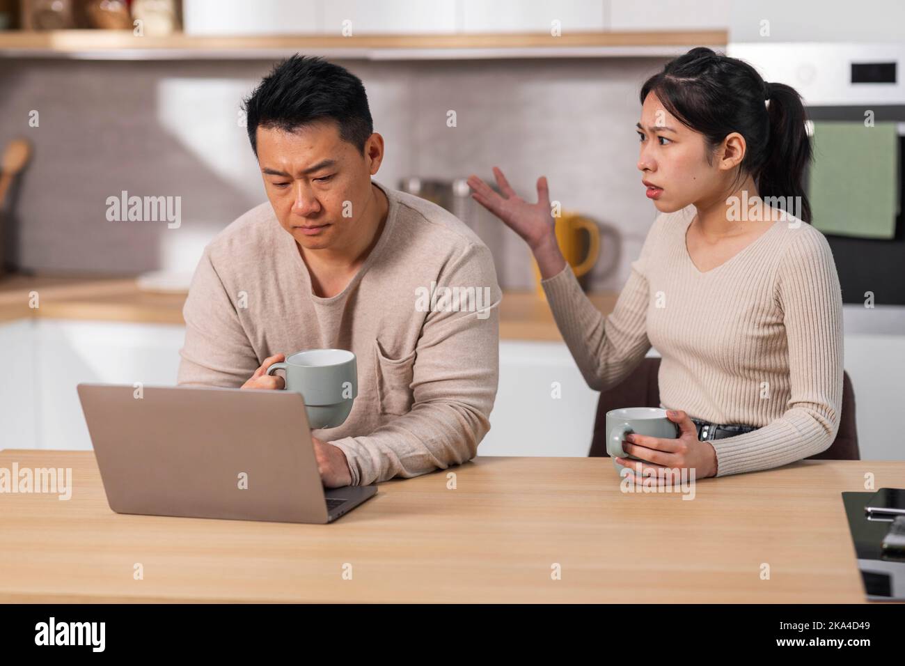 Furious japanese woman shouting at her husband Stock Photo Alamy