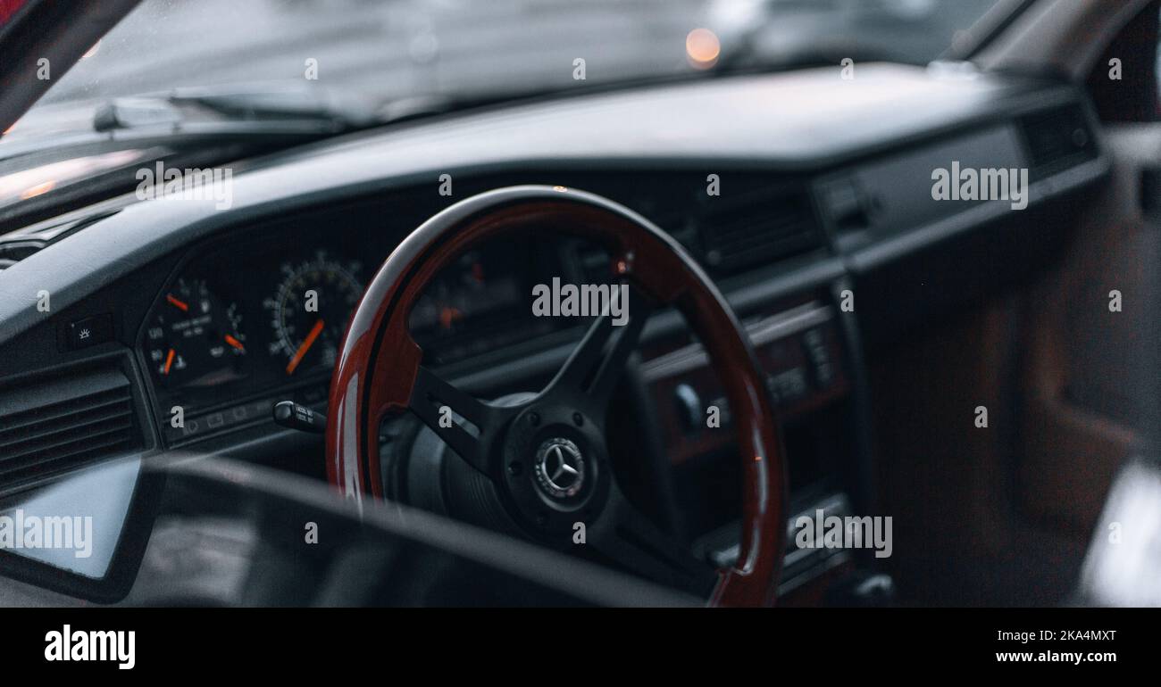 A closeup of the steering wheel of a Mercedes 190E Stock Photo - Alamy