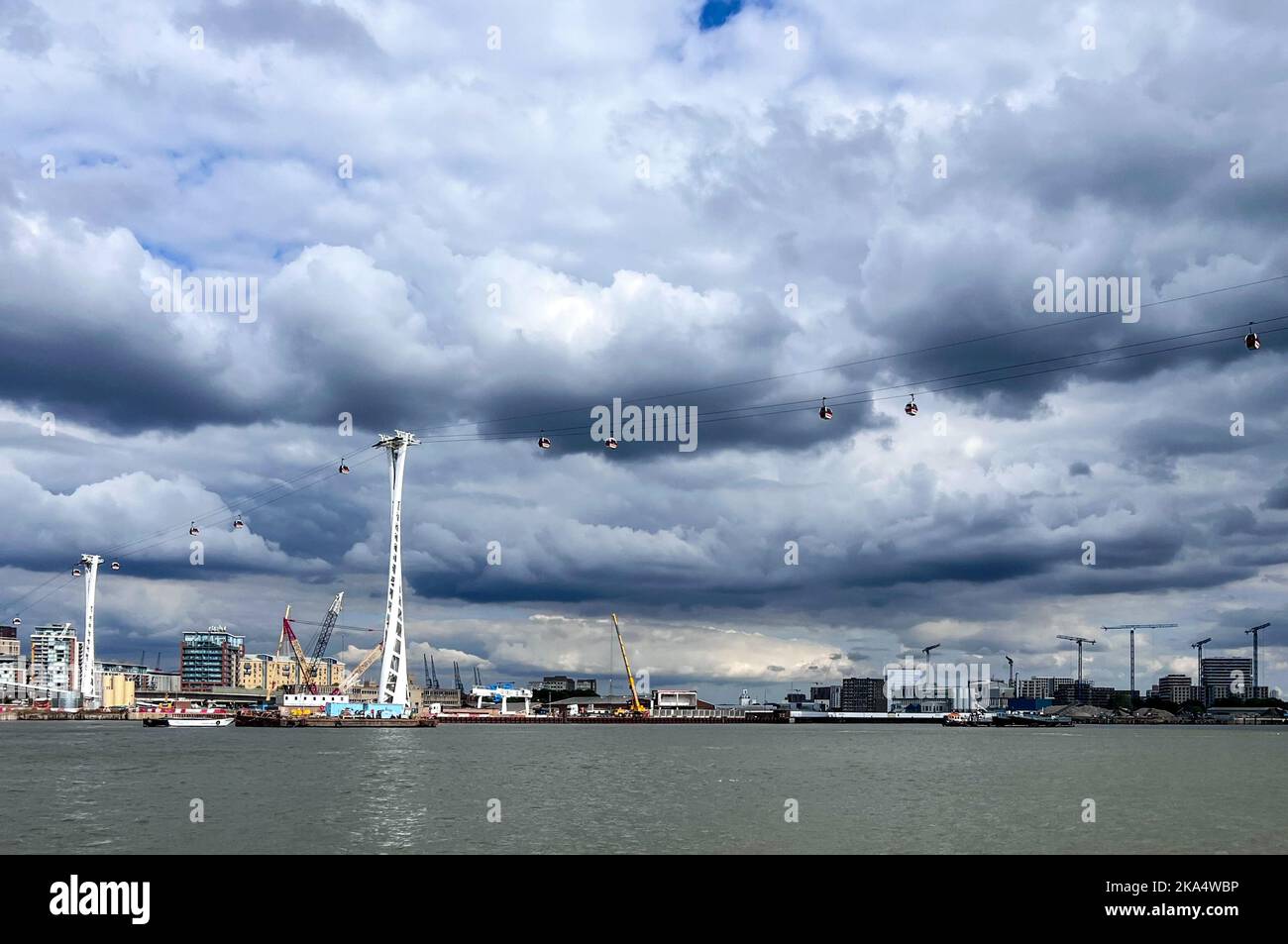 Storm clouds over London Cable Car and Royal Docks, London, England, UK Stock Photo