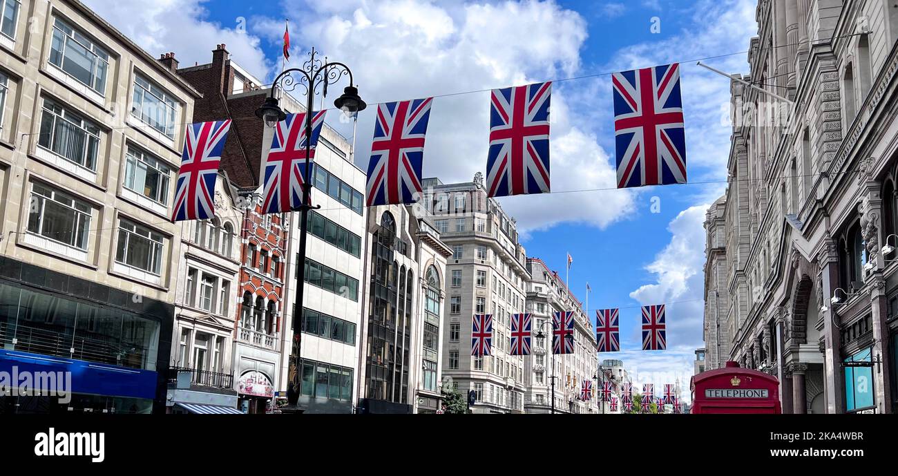 Low angle view of UK flags across The Strand, London, England, UK Stock Photo