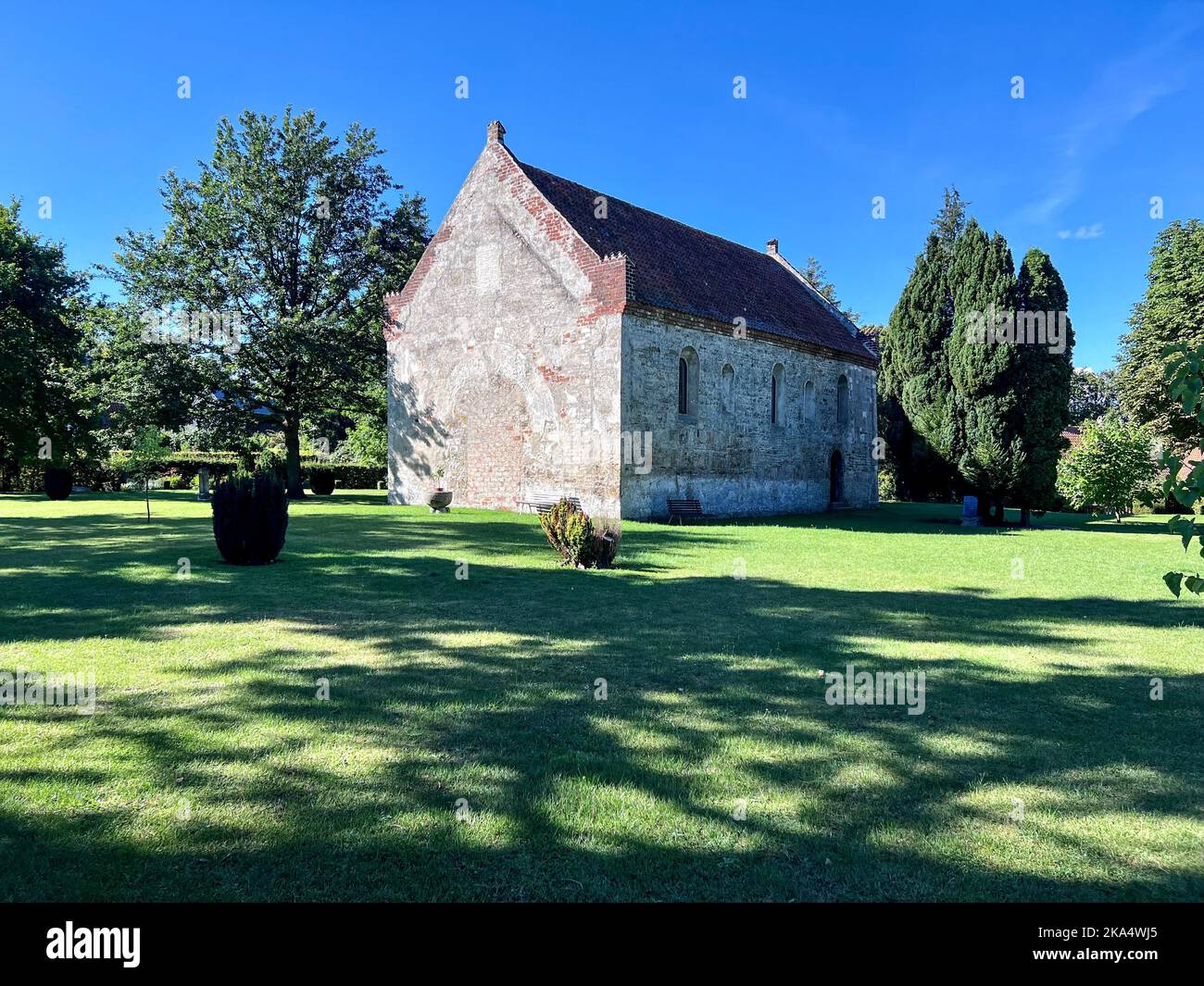 Former St James' Church and public garden, Roskilde, Zealand, Denmark Stock Photo