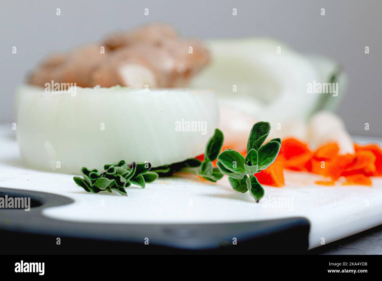 Textured Thyme on White Cutting Board Stock Photo
